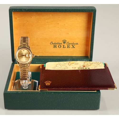 108 - Rolex 18K yellow gold Oyster Perpetual Date Just Ladies wrist watch, champagne dial with hour marker... 