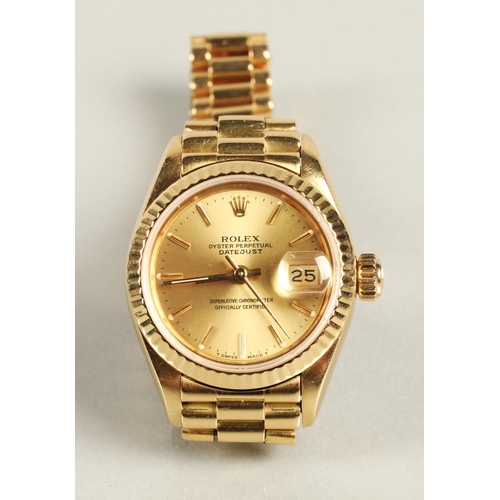 108 - Rolex 18K yellow gold Oyster Perpetual Date Just Ladies wrist watch, champagne dial with hour marker... 