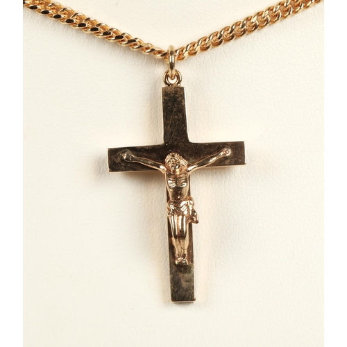 56 - 9ct yellow gold cross pendant on a 9ct yellow gold chain. total weight 16.8g.