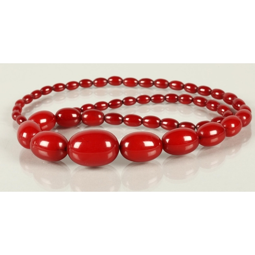 78 - Cherry amber string of graduated beads, 76cm long, 73.8g.