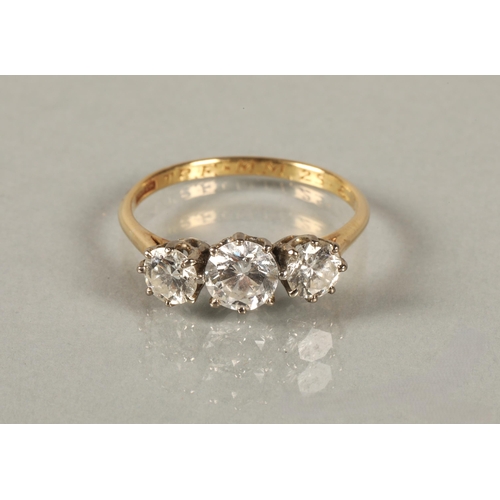 50 - Three stone graduated diamond ring, central stone 0.75 carats flanked by two 0.5 carat stones in pla... 