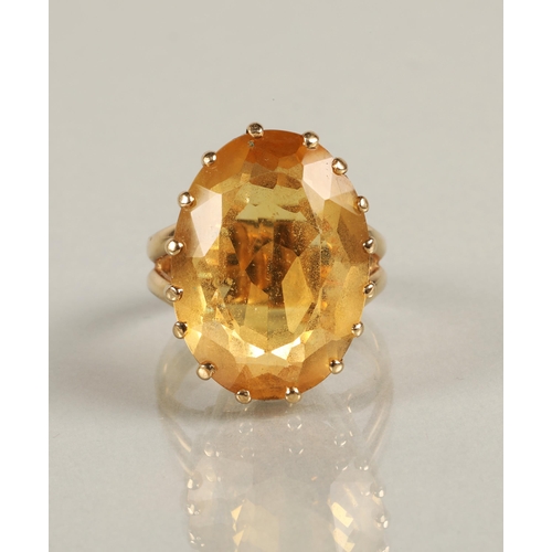 59 - Citrine dress ring 2.5cm x 1.8cm in 9ct yellow gold mount, ring size V.