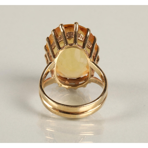 59 - Citrine dress ring 2.5cm x 1.8cm in 9ct yellow gold mount, ring size V.