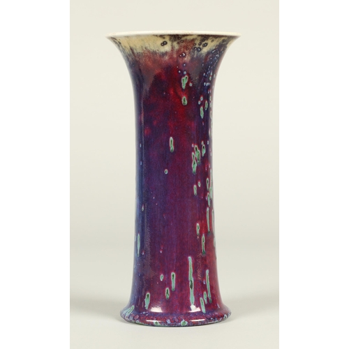 1 - Ruskin Pottery high fired lily vase, the glaze in mottled tones of grey, red and lavender, with impr... 