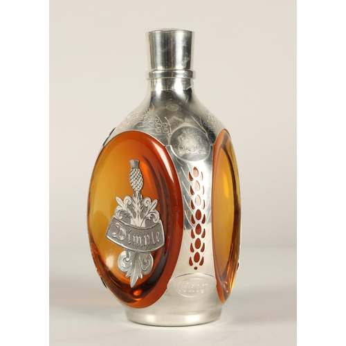 319 - Haig Dimple Royal Pewter blended scotch whisky, Contained in a decanter shaped bottle with presentat... 