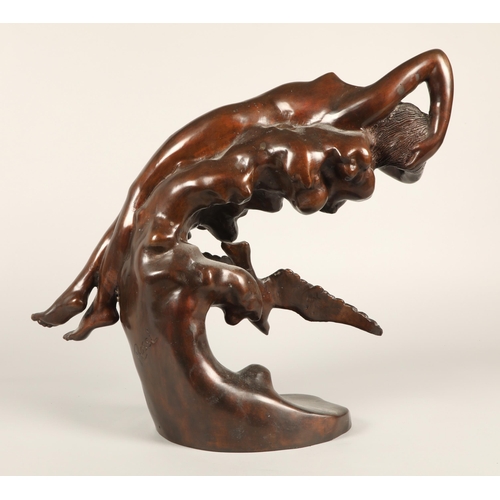 222 - Bronze sculpture of a reclining nude on a rock with bird, signed Rossi55cm high 60cm wide 20cm depth... 