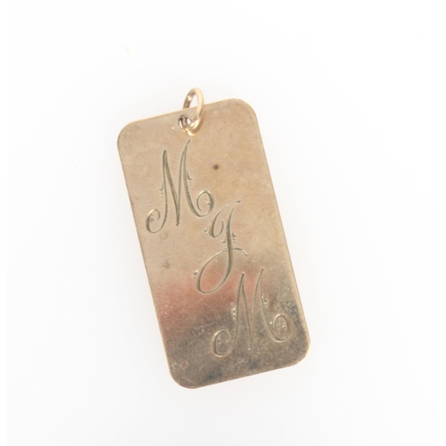 574 - 9ct gold monogrammed pendant, 5.9g.