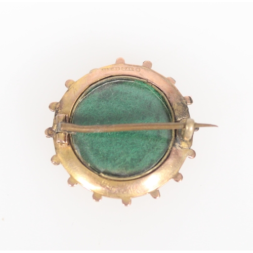 575 - Late Victorian 9ct gold brooch of round form with central seed pearl with rear glazed compartment, 2... 