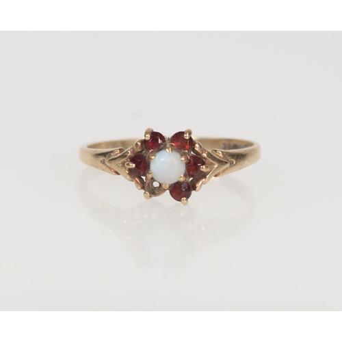 588 - 9ct gold opal and garnet cluster ring, missing one garnet, size Q, 1.6g.