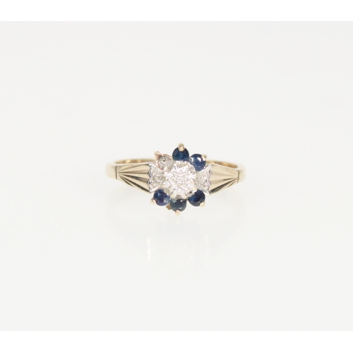 589 - Yellow metal sapphire and diamond cluster ring, size L/M, missing one sapphire.