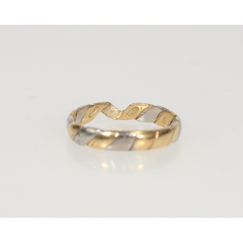 597 - Yellow metal and platinum two tone ring, hallmark missing due to resize, size T/U, 4.2g.