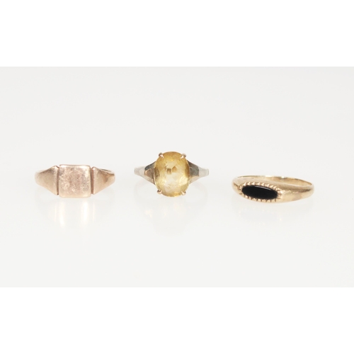 604 - Three 9ct gold rings, gross 4.9g.