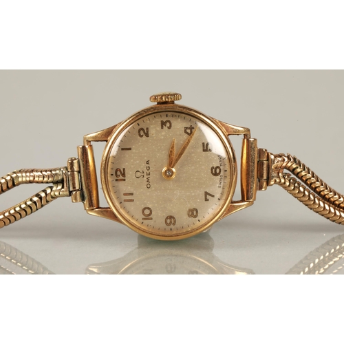 118 - Ladies Omega 9ct yellow gold wrist watch on a 9ct gold bracelet strap, 16g