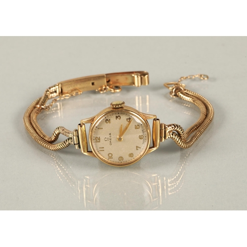 118 - Ladies Omega 9ct yellow gold wrist watch on a 9ct gold bracelet strap, 16g