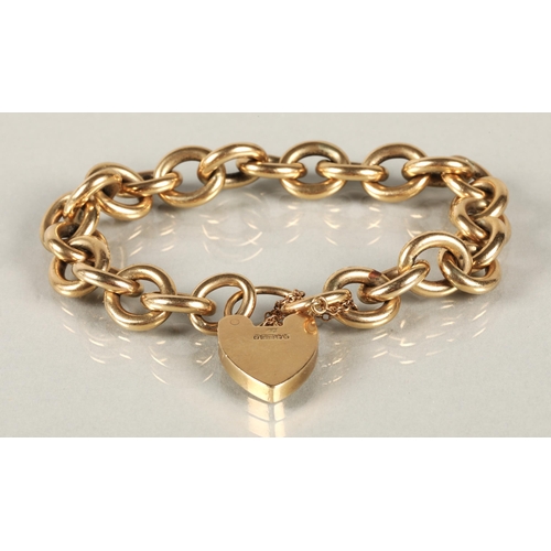 68 - Ladies 9ct yellow gold cable pattern bracelet with padlock clasp, 53.5g.