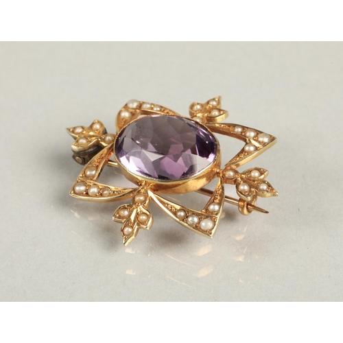 84 - Ladies 9ct yellow gold amethyst and seed pearl brooch.