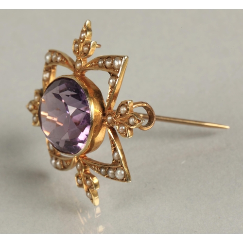 84 - Ladies 9ct yellow gold amethyst and seed pearl brooch.