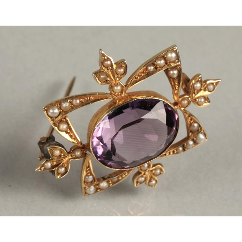 84 - Ladies 9ct yellow gold amethyst and seed pearl brooch.