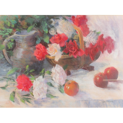 504 - JACKIE SIMMONDS, still life basket of roses and apples on a table top, pastel, signed lower right, 4... 