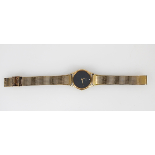 648 - Seiko Quartz black dial wristwatch on plated metal strap.