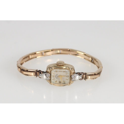 665 - Solar Liberty 14ct gold ladies cocktail watch on plated strap.