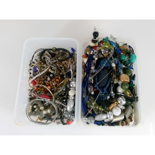 671 - Two boxes of costume jewellery incl. beaded necklaces, bracelets, brooches etc.