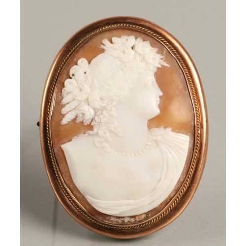 65 - Large cameo brooch mounted in 9ct rose gold, 6.5cm high 5cm wide.