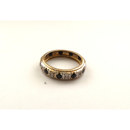 493 - 9ct illusion set diamond and sapphire ring and 9ct white stone eternity ring, gross weight 7g.