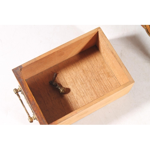 15 - Edwardian oak cased smoker cabinet with glazed front, 43cm high.