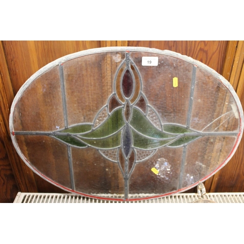 19 - Oval stained glass panel, 64cm wide.