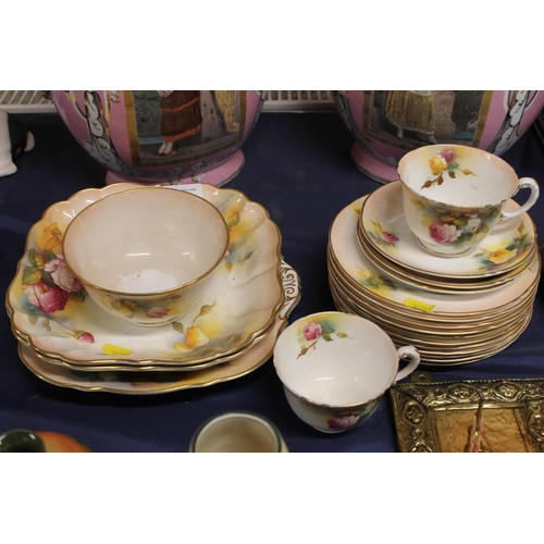 25 - Royal Worcester porcelain print decorated with roses part teaset.