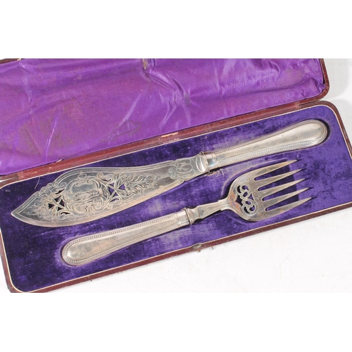 28 - Silver-plated fish knife and fork serving set in original box.