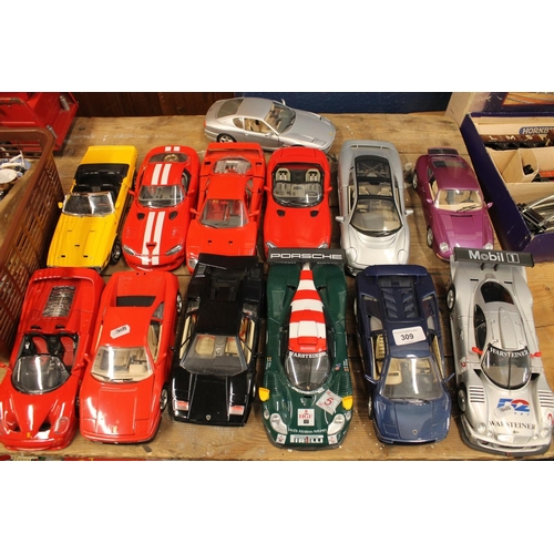 309 - Thirteen large scale Maisto and Burago cars to include Ferrari, Porsche, Lamborghini, etc. 