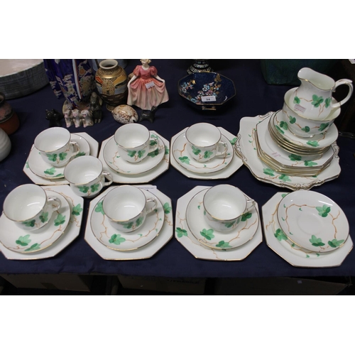 33 - Paragon China teaset decorated with green leaves.