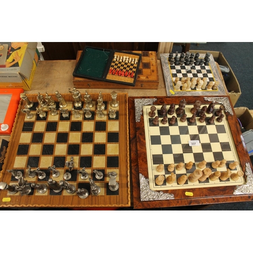 337 - Four partial chess sets.