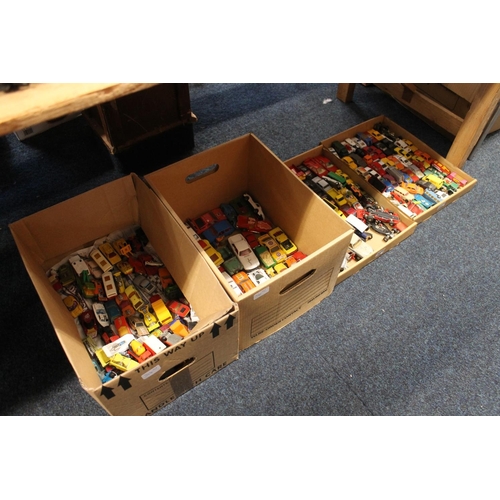 344 - Four boxes containing die-cast model vehicles to include Corgi, Corgi Juniors, Matchbox, etc.