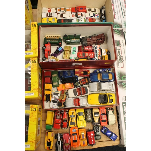 349 - Three boxes containing die-cast model vehicles to include Maisto, Matchbox, Lledo and others.