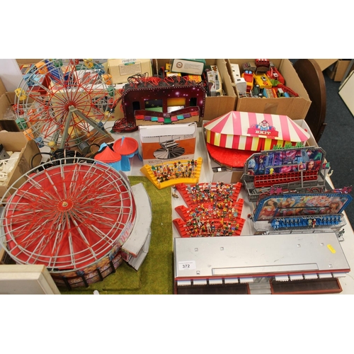 Circus layout models to include figures on stands, waltzers, big top ...
