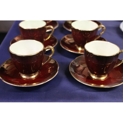 40 - Carltonware Rouge Royale six piece cofffee set with cream and sugar.