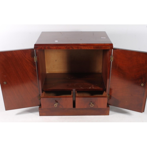 8 - 20th century mahogany cabinet, 39cm high.