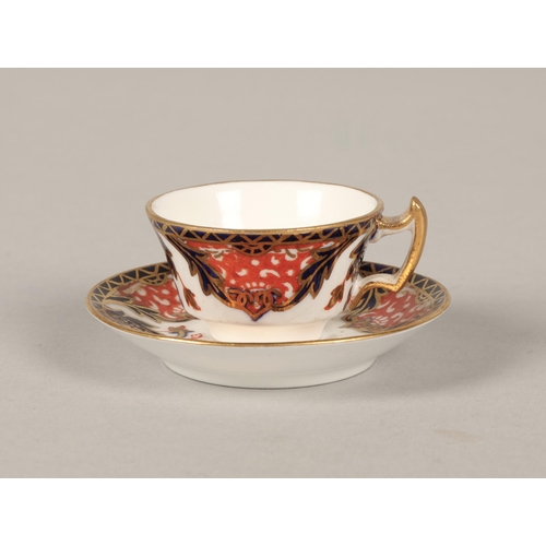 18 - Royal Crown Derby Imari pattern miniature tea cup, saucer and side plate, basket, and lidded pot