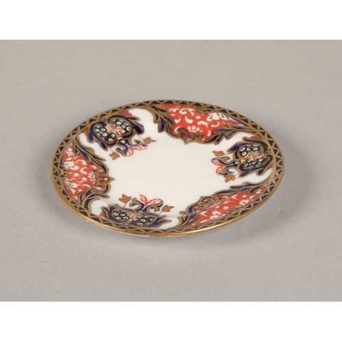 18 - Royal Crown Derby Imari pattern miniature tea cup, saucer and side plate, basket, and lidded pot