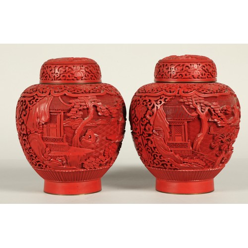 37 - Pair of Chinese cinnabar lacquered ginger jars and covers, relief decorated with Chinese garden, 20c... 