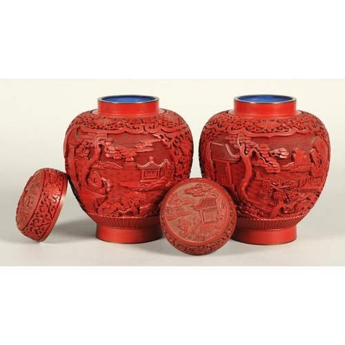 37 - Pair of Chinese cinnabar lacquered ginger jars and covers, relief decorated with Chinese garden, 20c... 