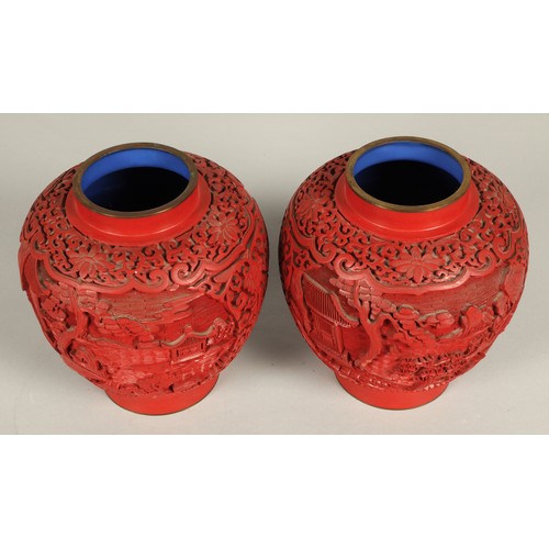 37 - Pair of Chinese cinnabar lacquered ginger jars and covers, relief decorated with Chinese garden, 20c... 