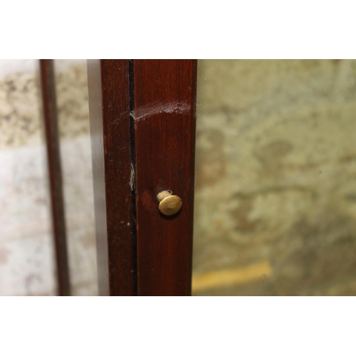 741 - Two mahogany wall cabinets.