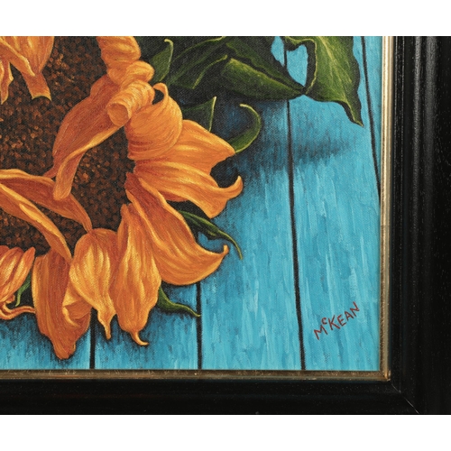 508 - Graham McKean (Scottish born 1962)Sunflowers on a Blue TableFramed oil on canvassigned38cm x 37cm AR... 