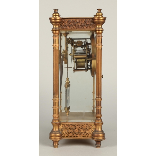 177 - Brass four glass clock with mercury pendulum 33cm high