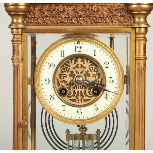 177 - Brass four glass clock with mercury pendulum 33cm high