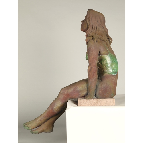 215 - Walter Awlson (Scottish b.1949)Seated female Sculpture in a swimsuit,signed, number 25/75.44cm high.... 